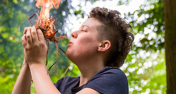 Woman creating fire